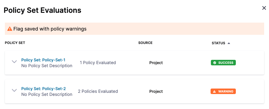 Screenshot of the warning message "Flag saved with policy warnings".